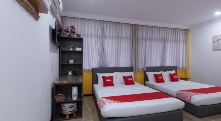 Hotel Oyo 89398 Doorbellz à Kota Kinabalu Extérieur photo